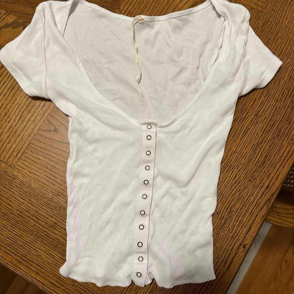 Are You Am I button up top